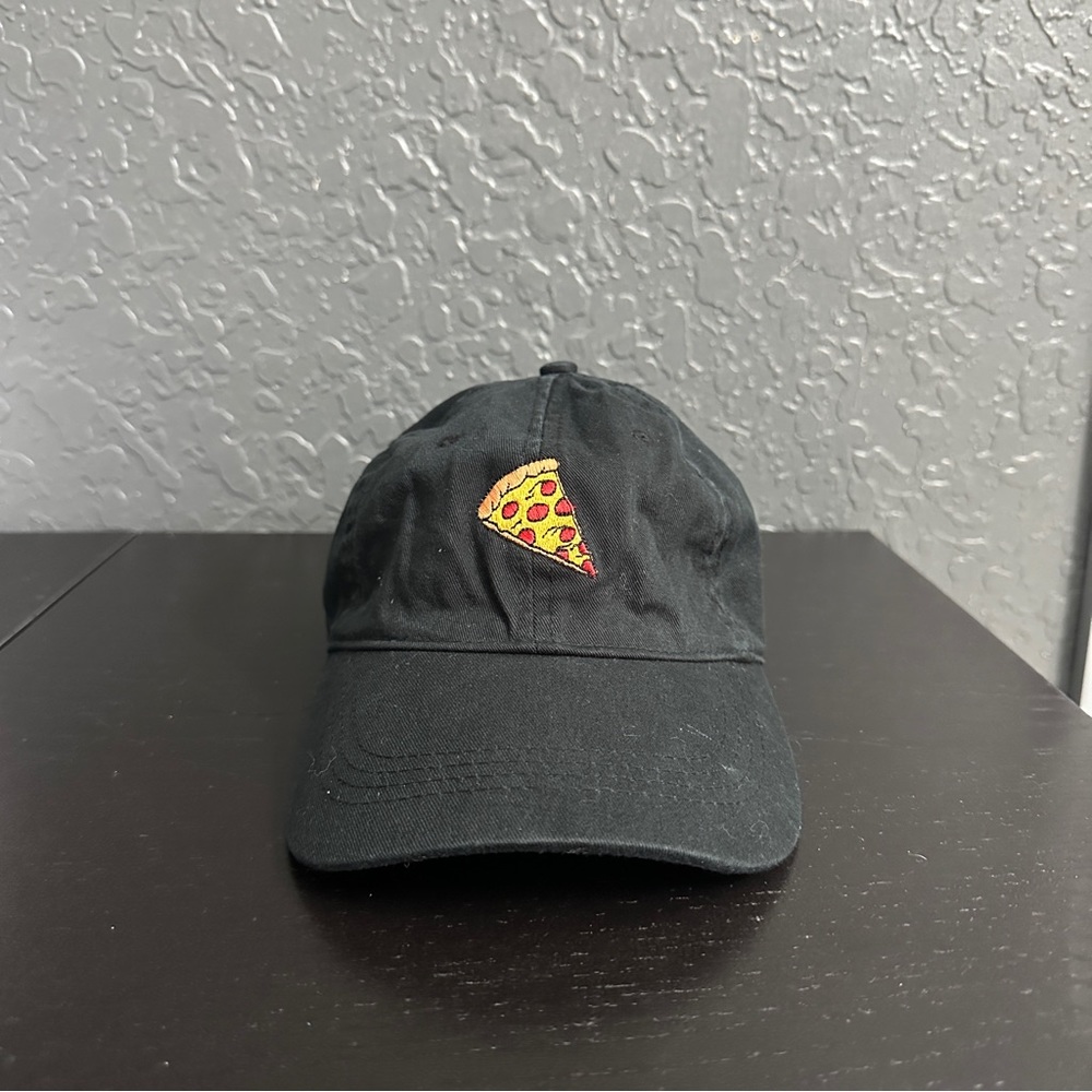Black dad cap with a pizza in the middle, never used. One size small / medium